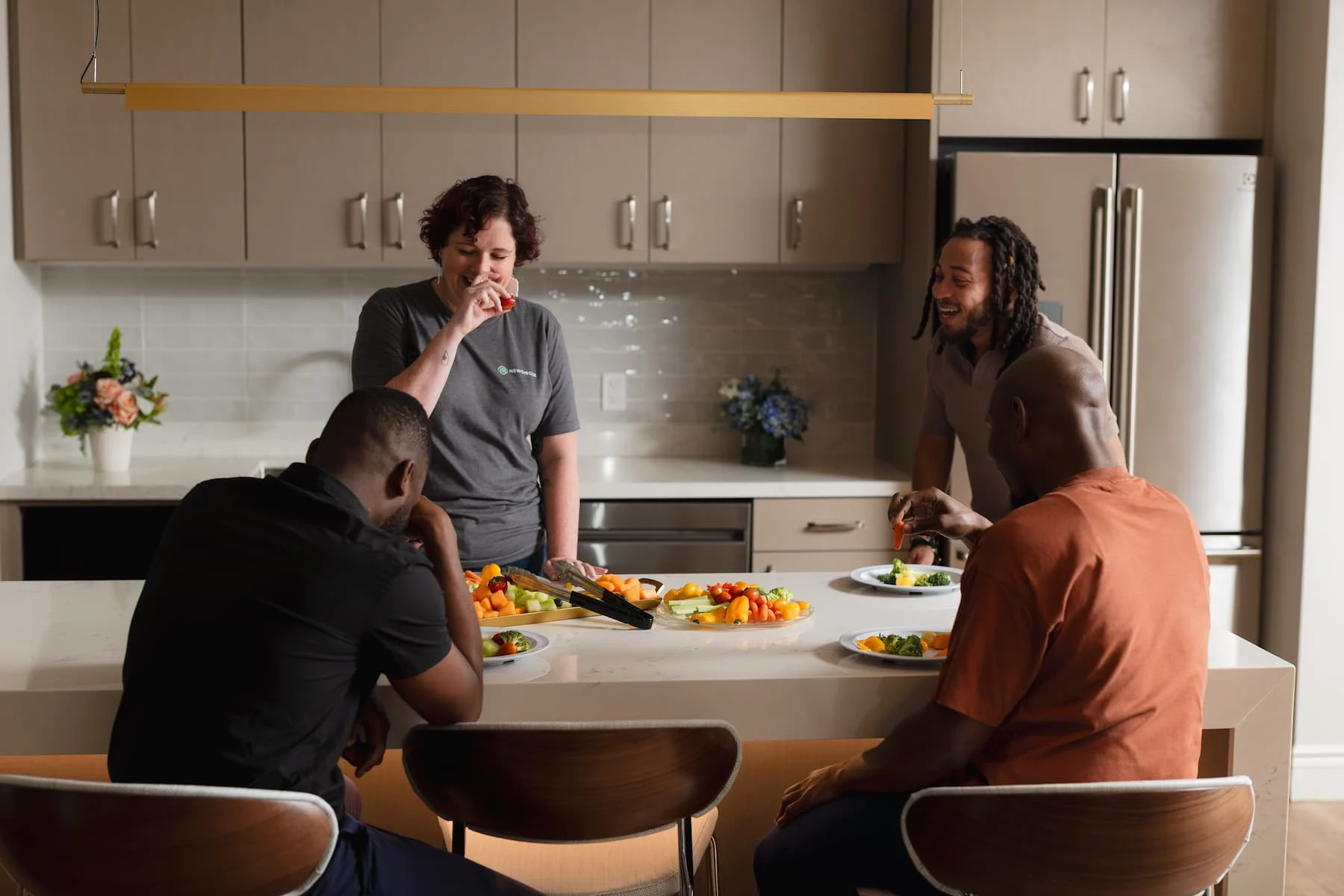 staff around kitchen table