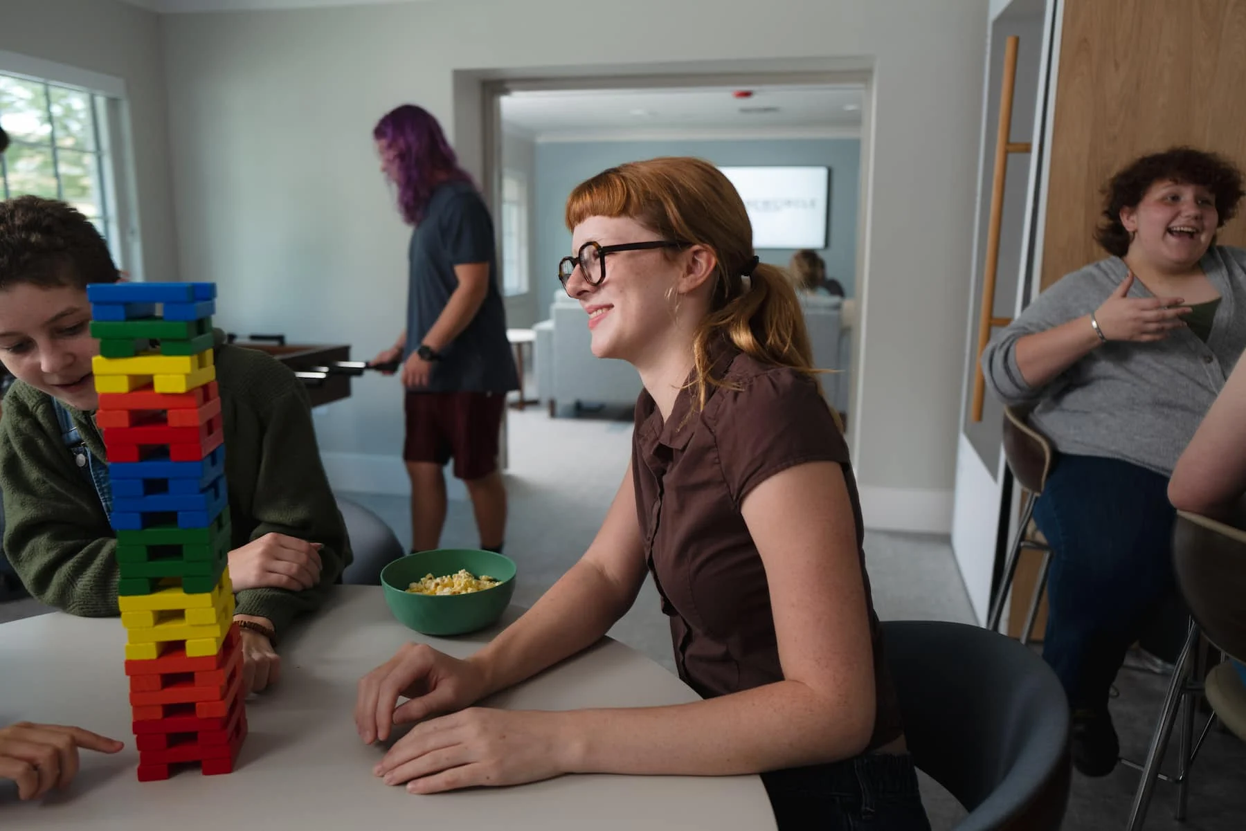 teen playing a board game