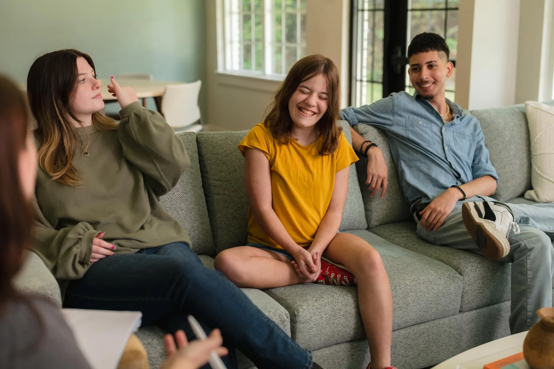 people in session on couch