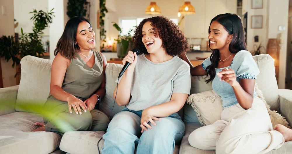 an image of happy teenagers, representing close friendship and support, offering a positive contrast to the isolation and hurt that body shaming can cause.
